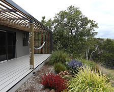 deck with pretty spring garden.JPG