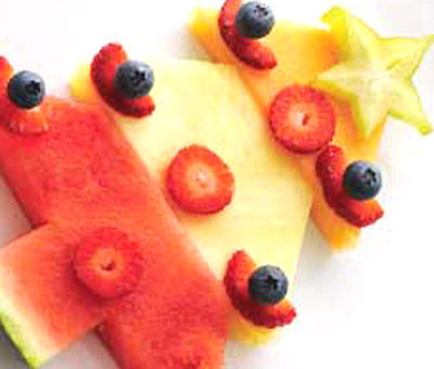 Arbol de Navidad hecho con fruta