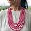 Thumbnail: Multi-Strand Cambodian Silk Bead Necklace in Pink Starburst