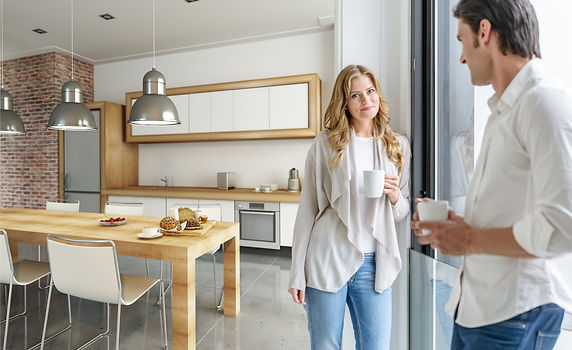 Couple in new kitchen