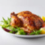lauwed_appetizing_roasted_chicken_on_a_clean_studio_tabletop_wi_242c8cfc-3e08-43e1-b2e7-8d