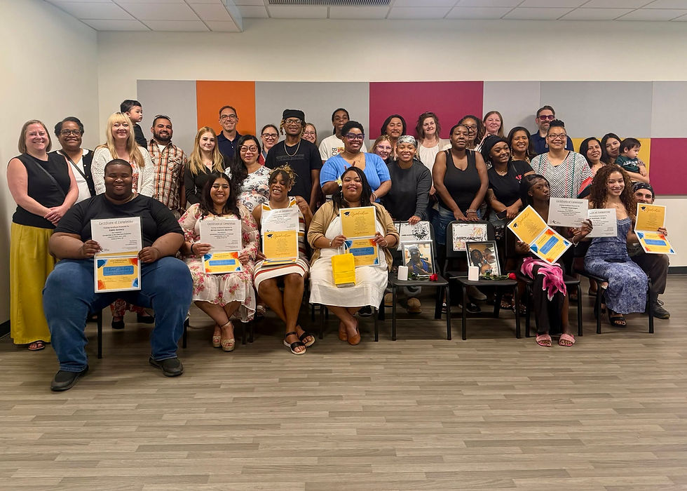 A large group photo of the early childhood education graduates, their families and the program providers.