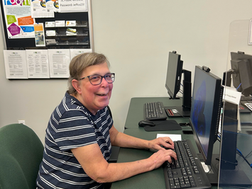 Patty working on a computer at the Jefferson County Workforce Development Center