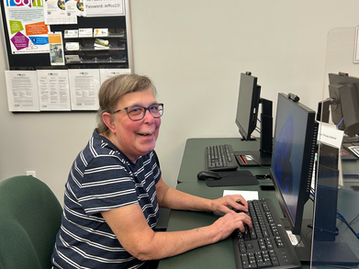 Patty working on a computer at the Jefferson County Workforce Development Center