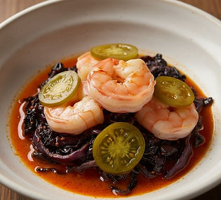 Harissa Butter Poached Shrimp with Charred Cabbage