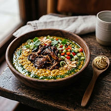 Pearl barley and red lentil dal with spiced mushrooms, vegan cumin butter and green oil