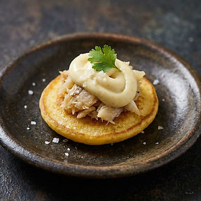 Coconut blini with saltfish
