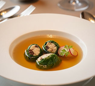 Chicken Quenelles in Consommé Raft