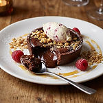 Molten Chocolate Tart with Oatmeal Crumble and Cranachan Cream photo