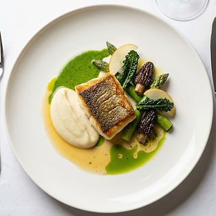 Pan-Seared Halibut with Celeriac and White Truffle Purée, Jalapeño, Wild Garlic and Coriander Emulsion, Asparagus and Morels in Butter Sauce, Apple and Cavolo Nero, and Fish Fumet with Dill Oil