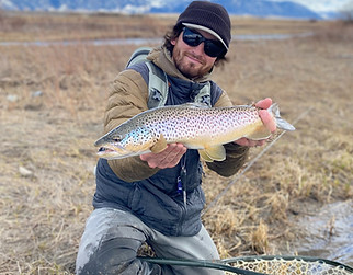 Angus Sullivan holding a big fish