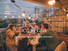 family and friends dining outside on a balcany