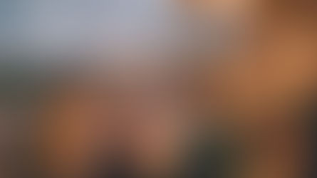 family and friends dining outside on a balcany