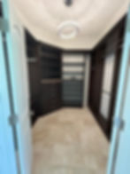 CLOSET WITH NATURAL STONE FLOORING