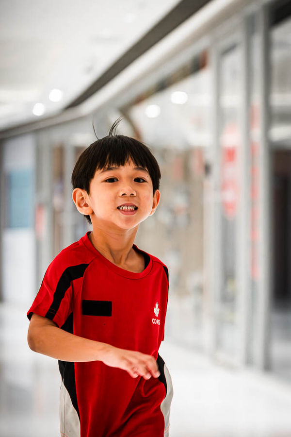 There’s something deeply nostalgic about school uniforms. They represent a chapter of pure joy, daily laughters, and friendships that shape who they are. 🌿
Looking at these beautiful moments captured right outside CDNIS 🇨🇦. The iconic red roof, the running steps, and those genuine, candid smiles in their favourite school tees. Every corner holds a piece of their childhood milestone.