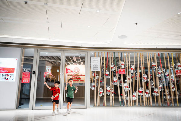 There’s something deeply nostalgic about school uniforms. They represent a chapter of pure joy, daily laughters, and friendships that shape who they are. 🌿
Looking at these beautiful moments captured right outside CDNIS 🇨🇦. The iconic red roof, the running steps, and those genuine, candid smiles in their favourite school tees. Every corner holds a piece of their childhood milestone.