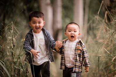 Family enjoying outdoor photo session at Nam Sang Wai forest trail