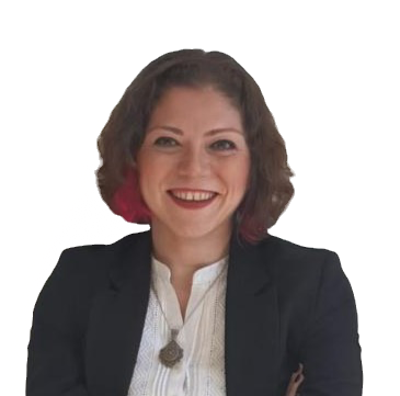 Siyah ceketli, beyaz bluzlu gülümseyen Edibe İpek KOZA, sade arka planda portre.