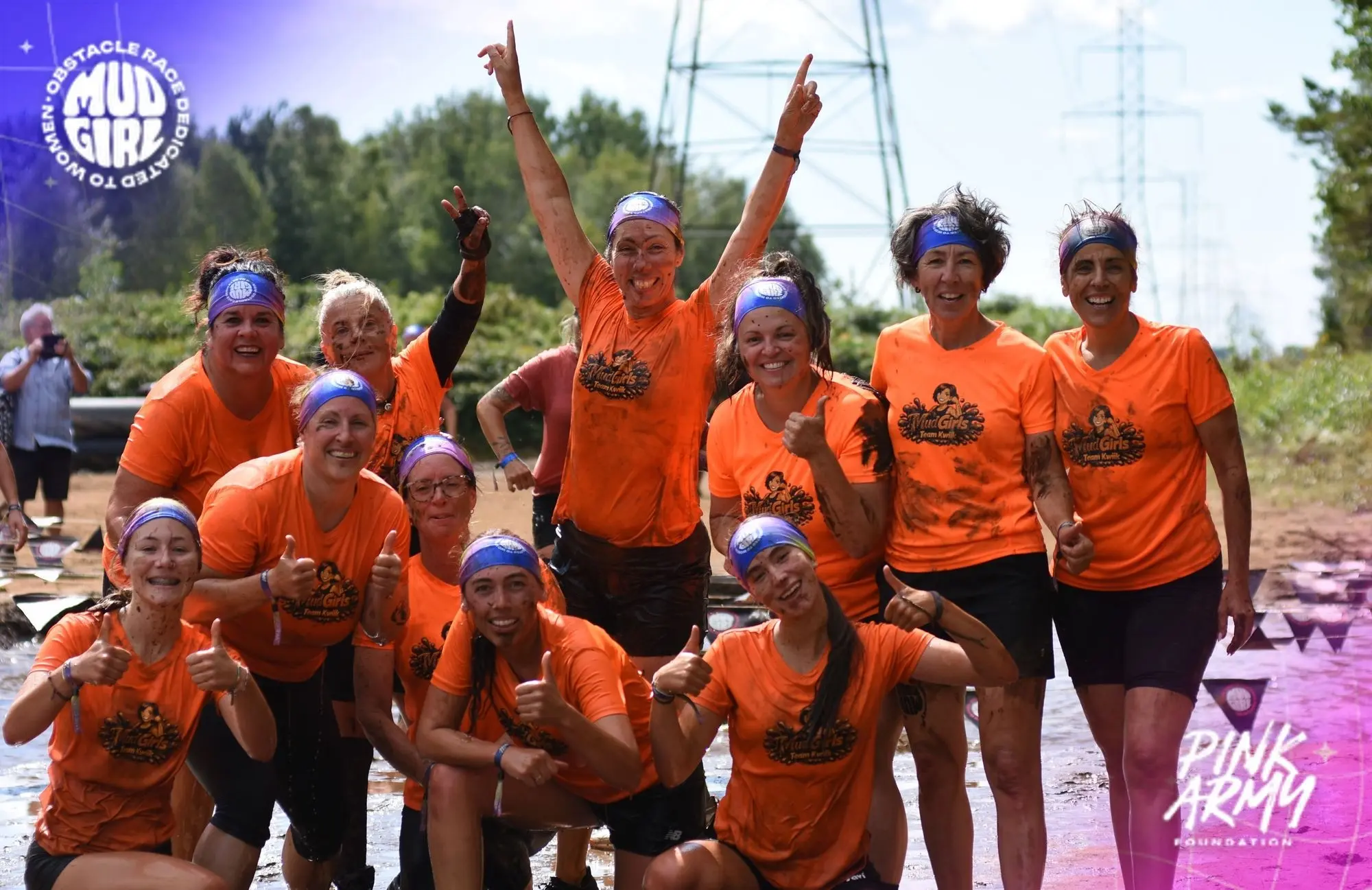 The muddy Kwiik team posing with thumbs up after the MUDGIRL race