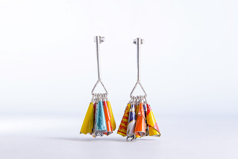 Thumbnail: Tonic Water earrings hanging straight, made with vibrant hand-cut recycled cans and sterling silver hooks, photographed on a