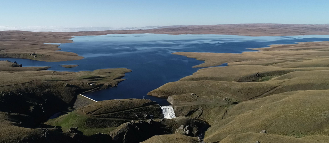 Dam from chopper at distance.png