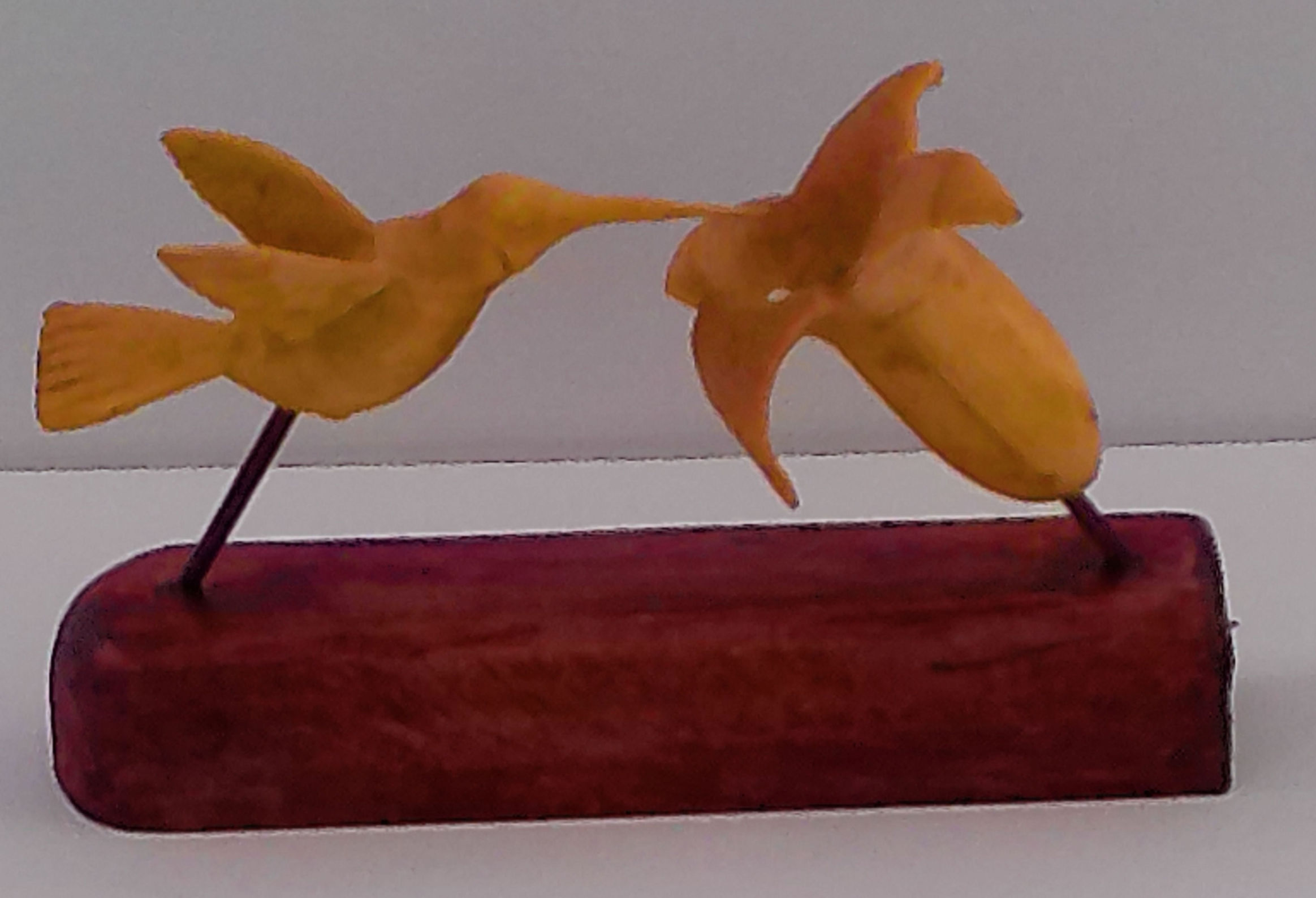 Carving of humming bird and a lilly June 2025