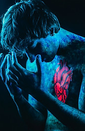 Blue man with red heart - pexels-isabella-mariana-1988698.jpg