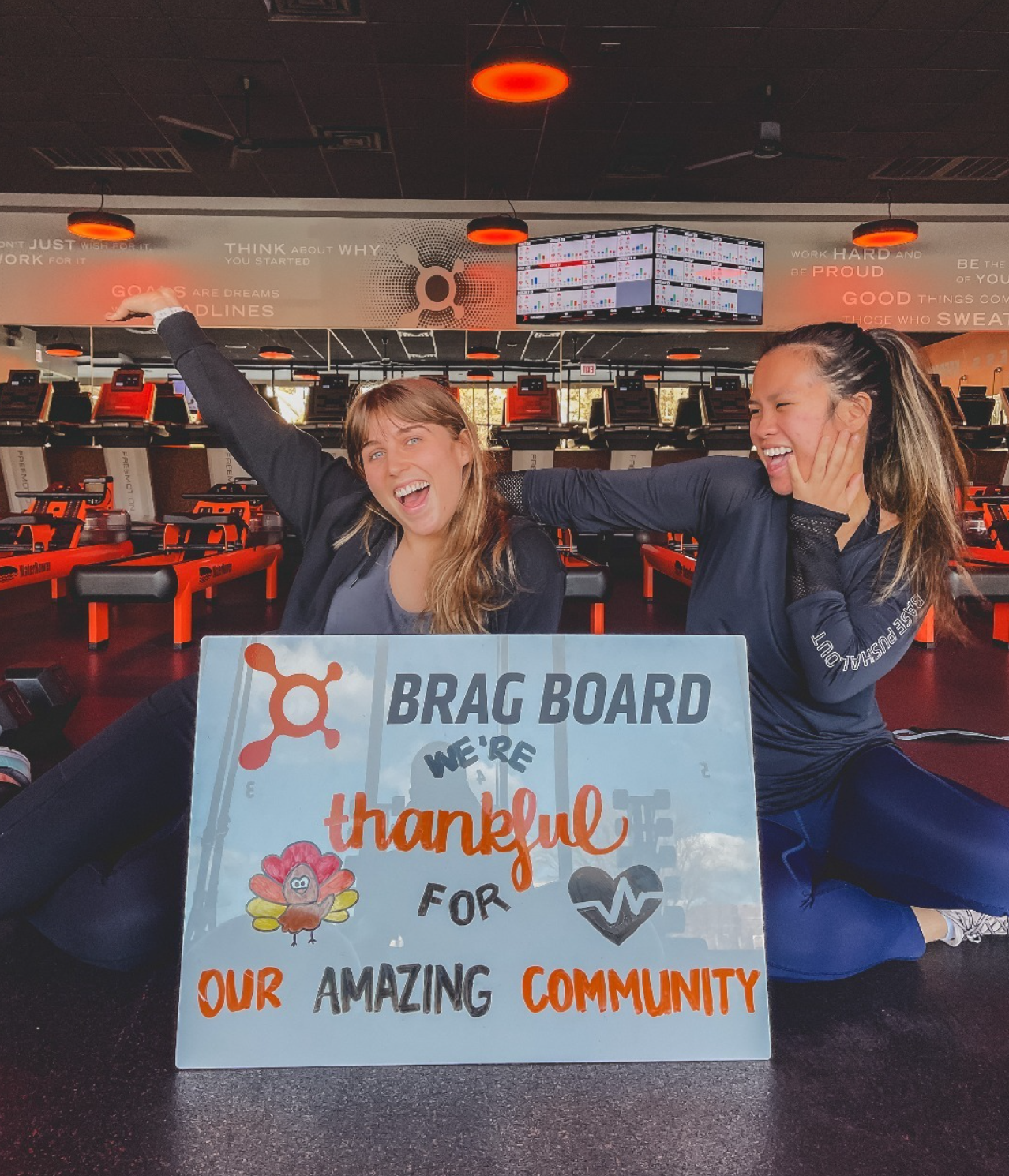 Welcome and promo chalkboard inside Orangetheory Charleston – West Ashley.