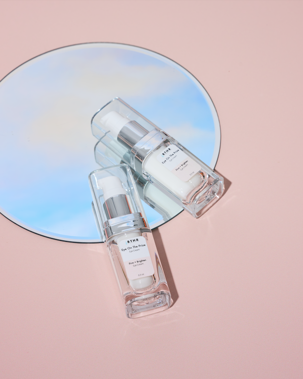 BTHR Eye On The Prize Eye Cream on an iridescent blue backdrop