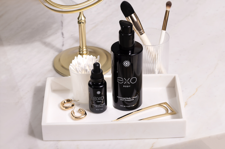 Exoceuticals skincare bottles styled on a vanity tray