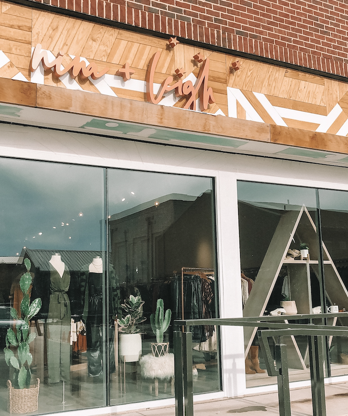 Nina + Leigh boutique storefront at Halcyon Alpharetta with blush signage