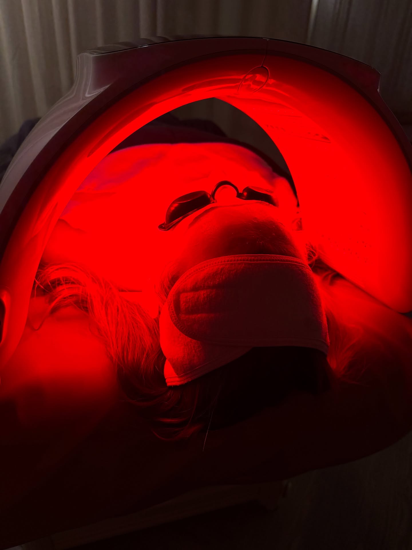 Client receiving red LED light therapy at FACE FOUNDRIE Austin Tarrytown