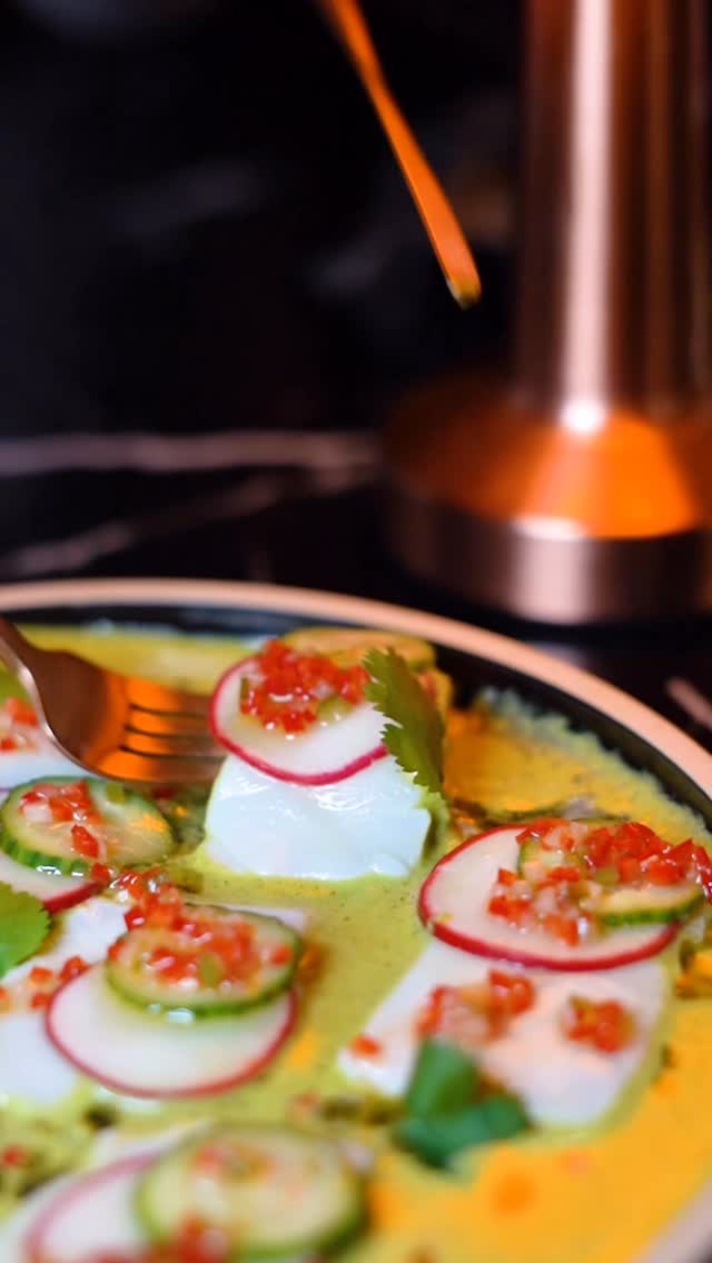 Platter of deviled eggs with jalapeno and radish at Beso Buckhead.