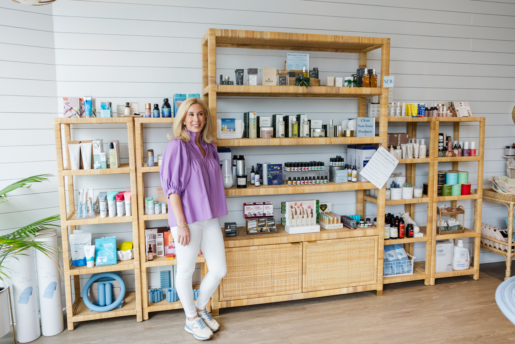 Shelves stocked with premium supplements, superfoods, and recovery gear inside Rest + Fuel’s retail nook.