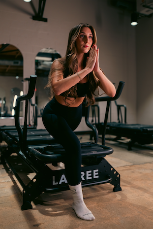 MPower Fitness client posing after class at the Charlotte Elizabeth studio