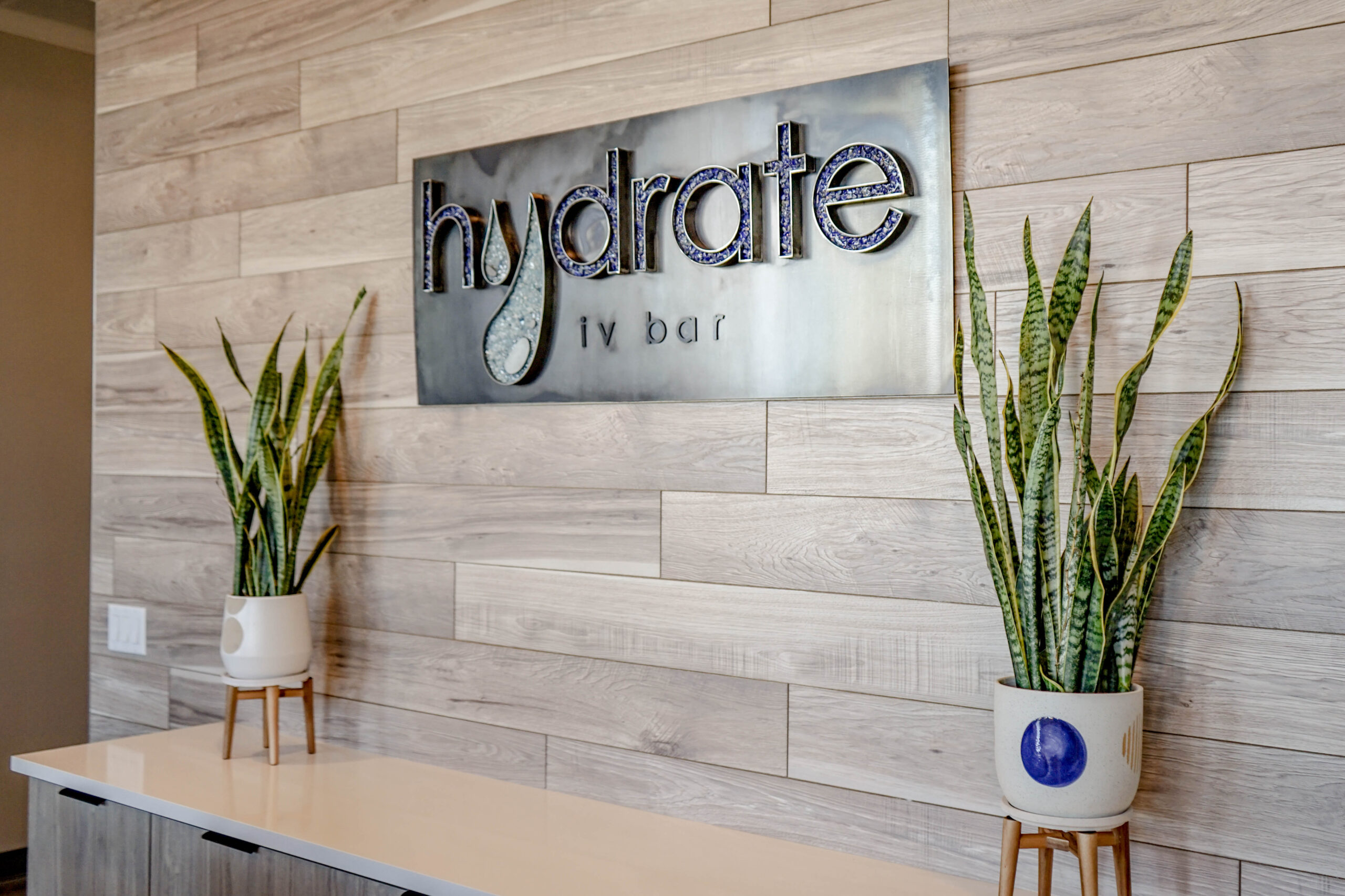 Hydrate IV Bar Midtown Atlanta reception sign and desk