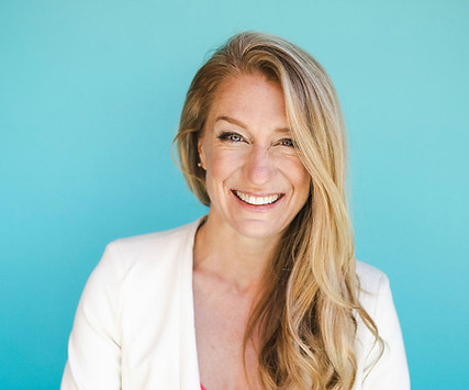Melanie-Levenberg-headshot-2026-Business-Smile.jpg