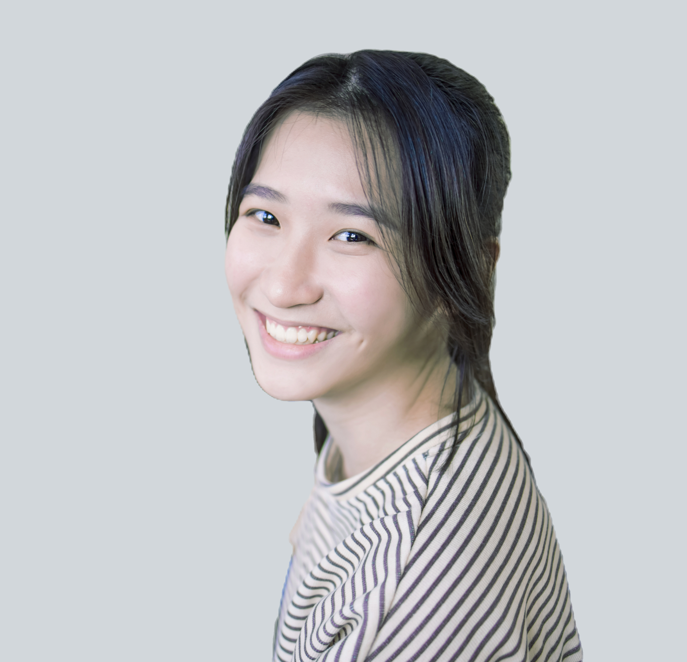 Smiling Student Sitting At Desk