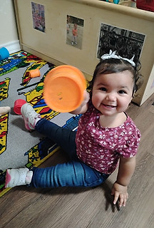 Toddler on the ground playing