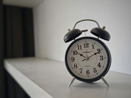 Clock representing delayed healthcare reimbursement and claim processing
