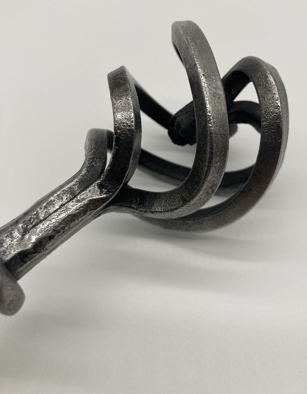 Thumbnail: A large pair of wrought iron coat hooks