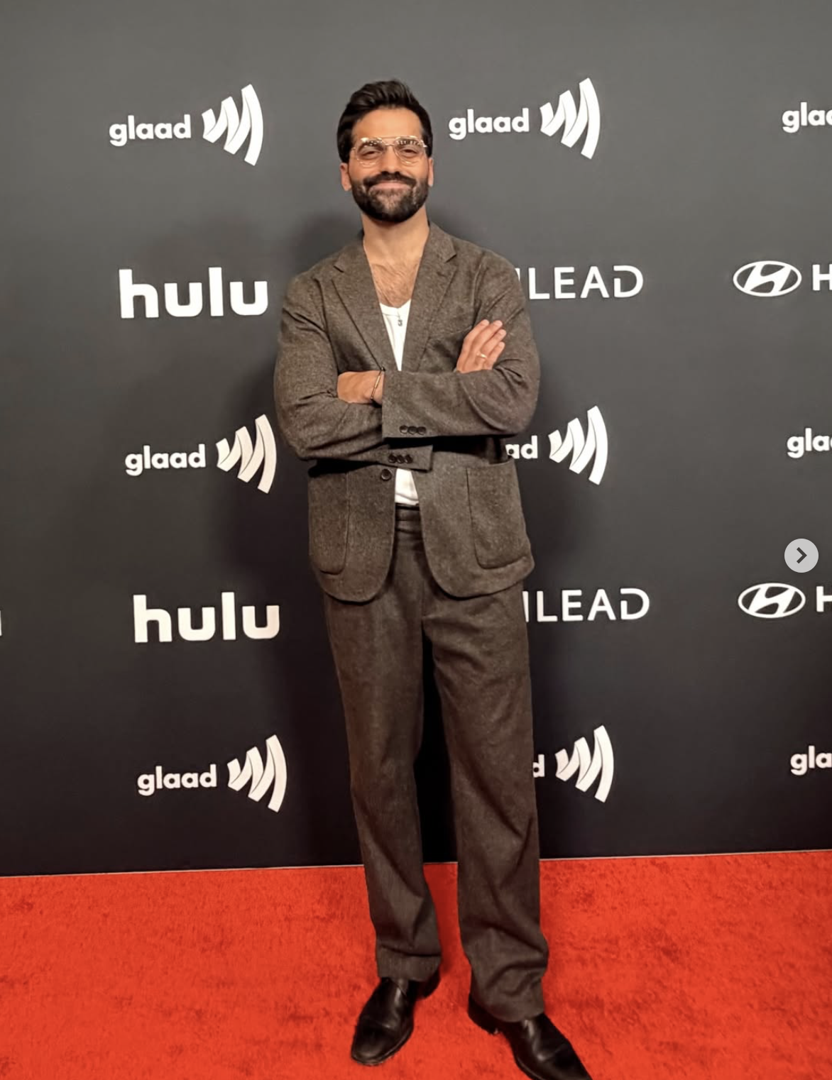 Andy Lalwani celebrity interviewer LGBTQ journalist entertainment media and host of Culture Shock Podcast | She Comes With Baggage Media
