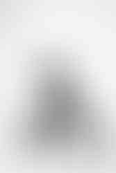 Portrait of Kirstie Nicole, award-winning content creator and founder of The Collective, developing She Comes With Baggage Media projects and hosting the She Comes With Baggage podcast.