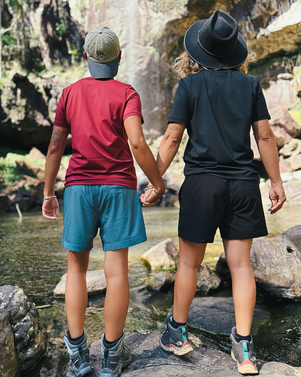 Model wearing Unity Cove gender-inclusive swimwear designed for comfort, coverage, and everyday movement. | She Comes With Baggage Media