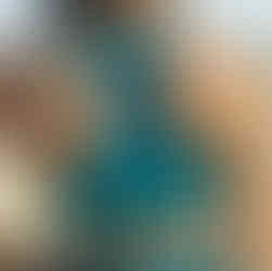 Model wearing Unity Cove gender-inclusive swimwear designed for comfort, coverage, and everyday movement | She Comes With Baggage Media