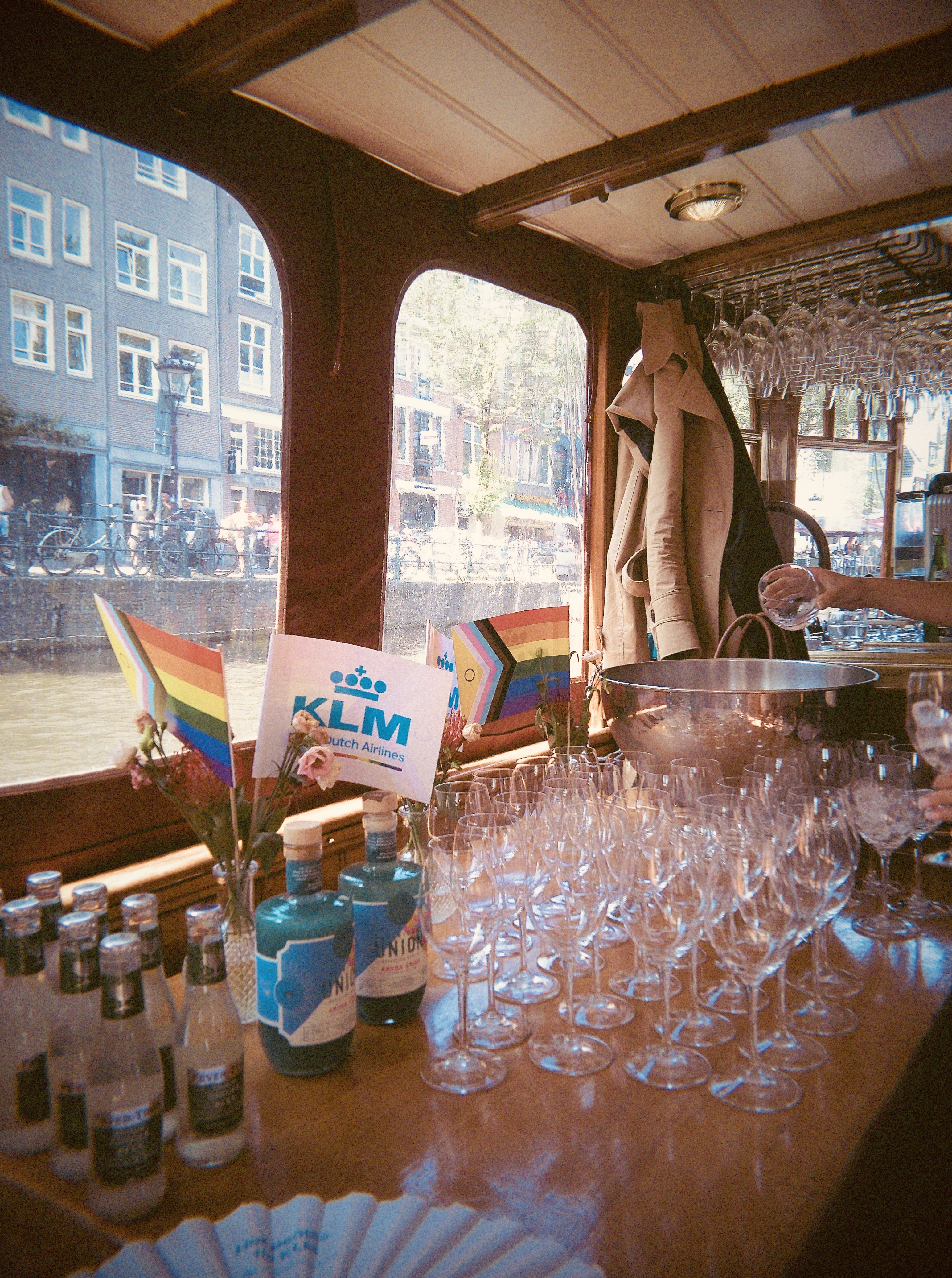 Discover how KLM celebrated WorldPride Amsterdam 2026 through its Pride House, Canal Parade boat, Pride flights and LGBTQI+ inclusion initiatives | She Comes With Baggage Media