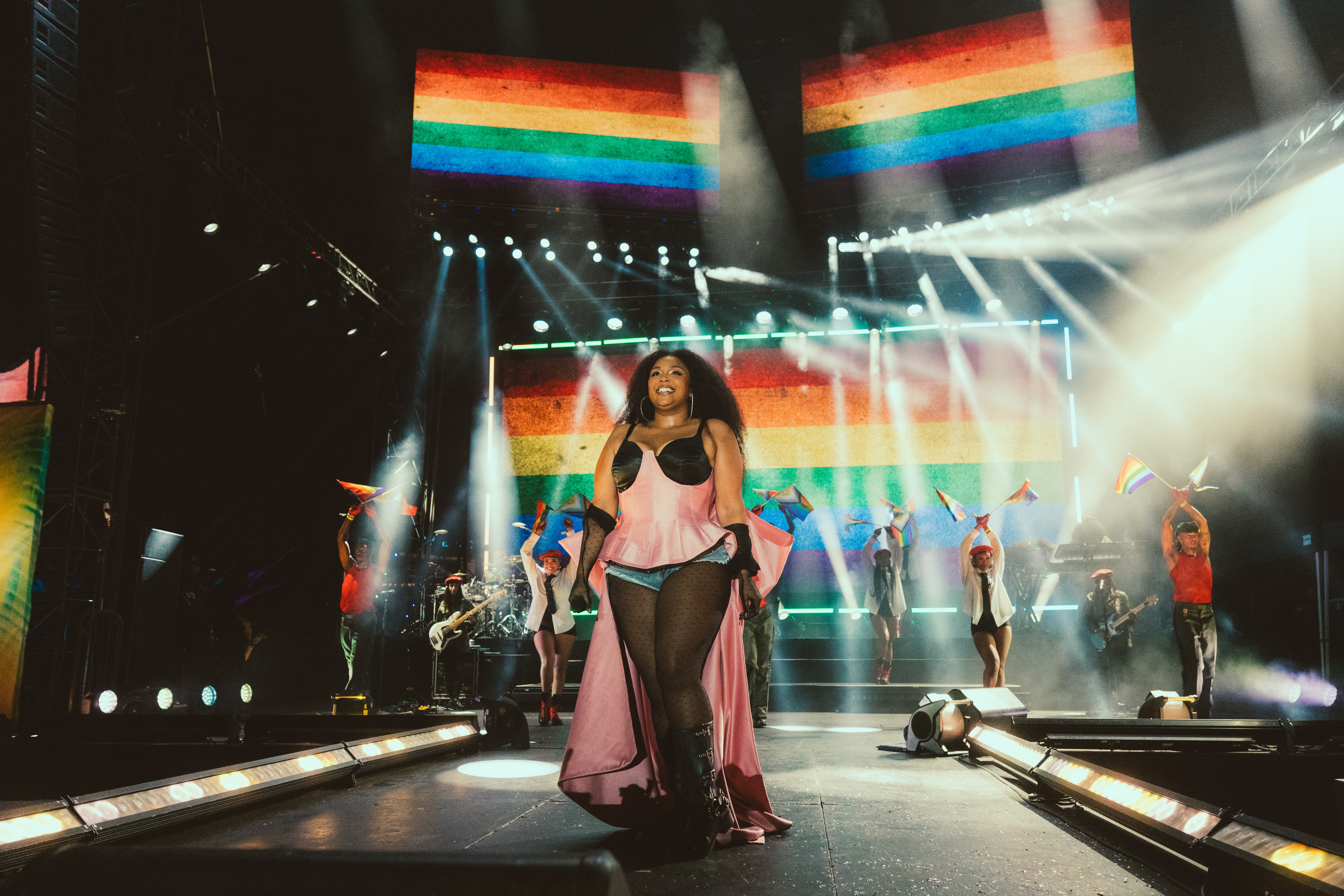 Lizzo Headlining OUTLOUD Music Festival 2025 at WeHo Pride, featuring top queer artists, live performances, and community connection | She Comes With Baggage Media
