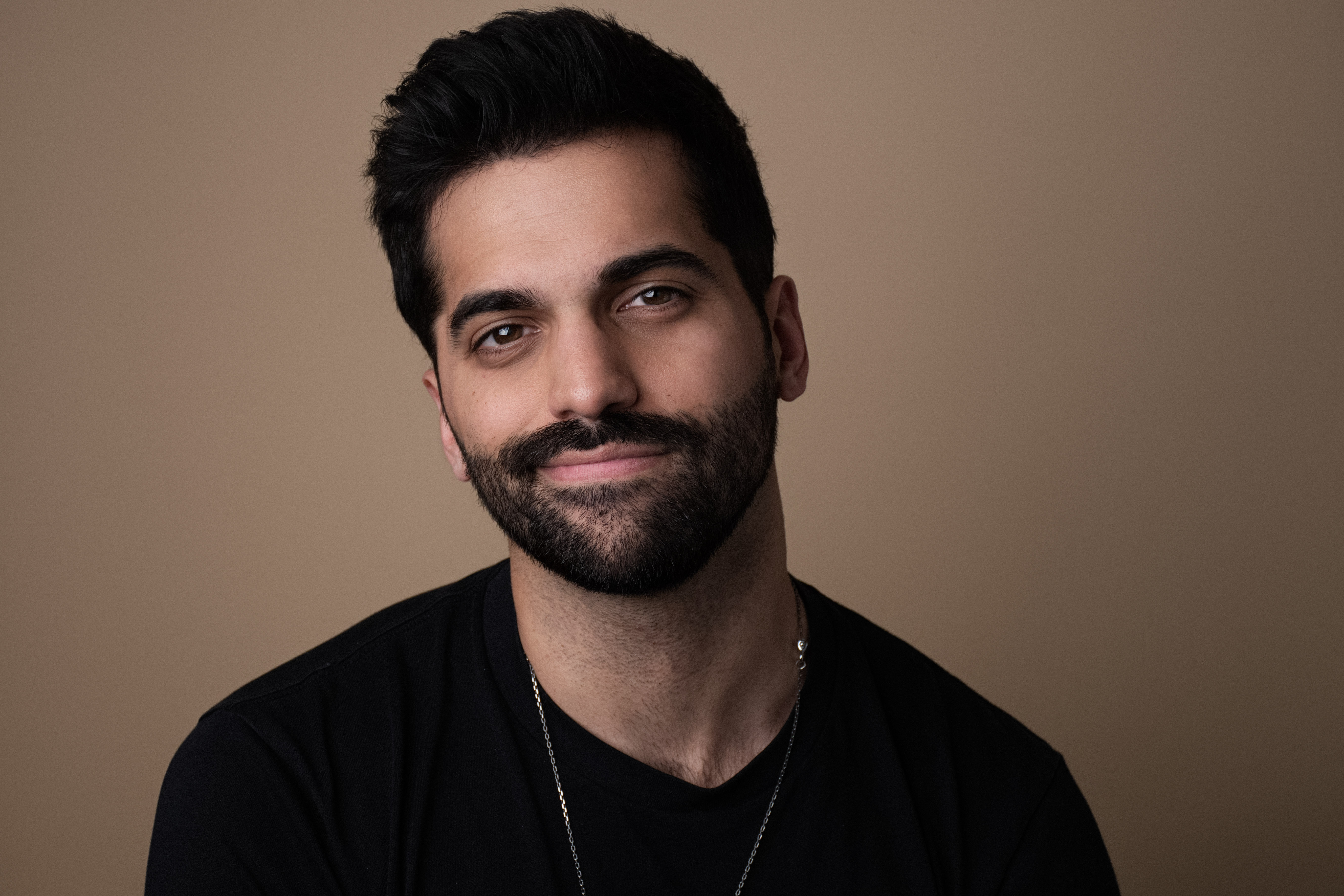 Andy Lalwani celebrity interviewer LGBTQ journalist entertainment media and host of Culture Shock Podcast | She Comes With Baggage Media
