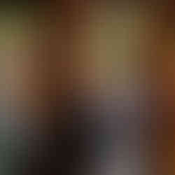 Parents mingling in the courtyard at Brody House during REAL Impact Night 2025.