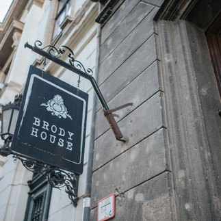 The Brody House sign on the exterior wall of the venue in Budapest.